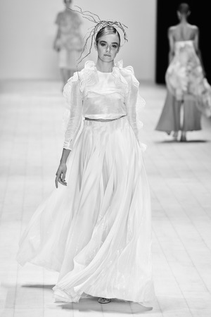 SYDNEY / AUSTRALIA - 20 May: Model walks on runway during Jessica Van show at The Innovators fashion design studio during Mercedes Benz Fashion Week Australia on 20 May 2016 in Carriageworks Sydneyのeditorial素材