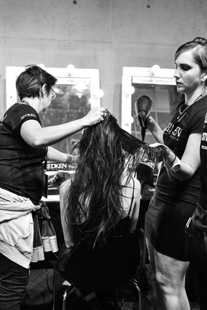SYDNEY / AUSTRALIA - 20 May: Models stylists and makeup artists get prepared for show before Raffles International Showcase at Mercedes Benz Fashion Week Australia on 20 May 2016 in Carriageworks Sydneyのeditorial素材