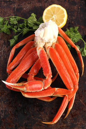 Crab legs on brown backgroundの写真素材