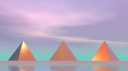 Three pyramids at the edge of the water with a purple blue skyの写真素材