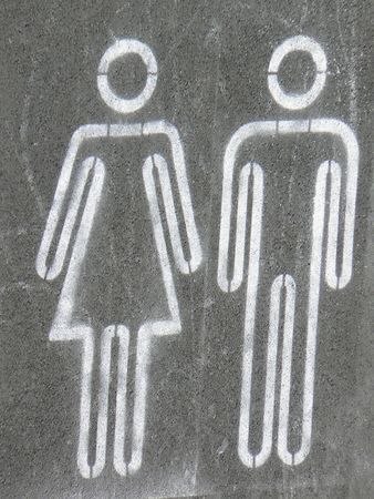 A symbolic painting on the ground a man and a woman of white paintingasの写真素材