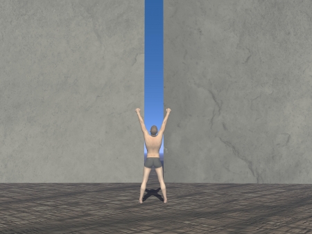 A man in front of the crack wallの写真素材