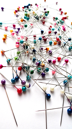 Needles for tailors. Tools for sewing. Tailoring needles. On a white background.の写真素材