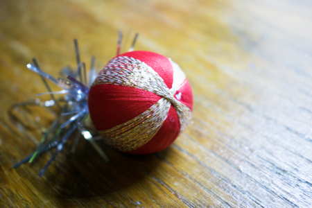 New Year's toy. A photo of a New Year's toy for decorating a Christmas tree for a holiday. On a...