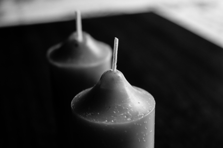 Photo hand maid candles. On a wooden background, on a bright day.の写真素材
