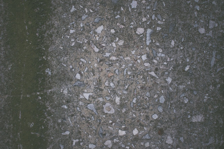 Photo texture gray stone, embossed. Natural natural monolith. Stone background.の写真素材