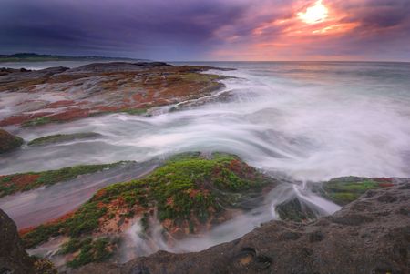 Blue skies over time-lapse waterの写真素材