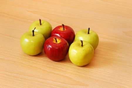 Four green and two red applesの写真素材
