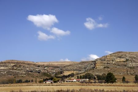 Farmhouse in the distanceの写真素材