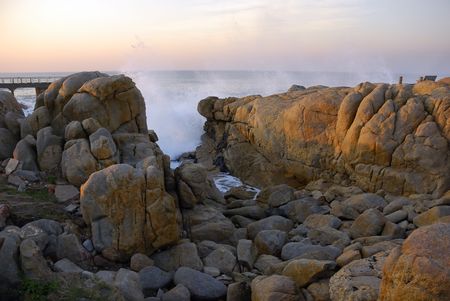Rocky seashore in South Africaの写真素材