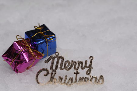 Artificial snow with Christmas decorationsの写真素材