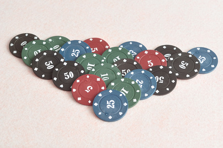 Poker chips forming a border on the left with a white background
