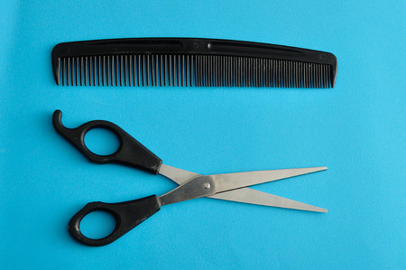 Hair cutting scissors and a combの写真素材