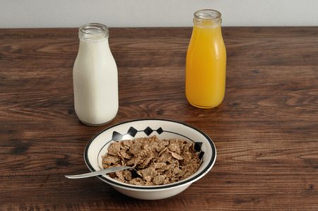 Breakfast with cereal, milk, orange juiceの写真素材