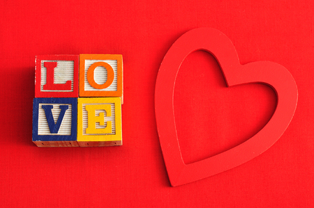 Valentine's Day.Love Spelled with colorful alphabet blocks and a red heartの写真素材