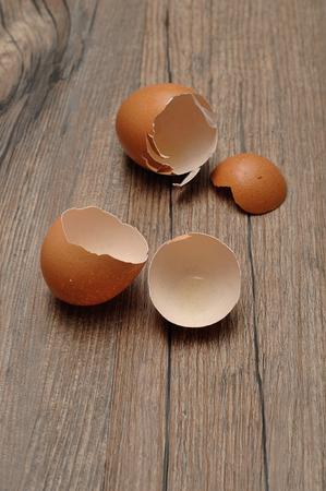 Egg shells on a wooden table
