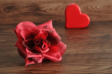 Valentine's Day. A red heart with a red roseの写真素材