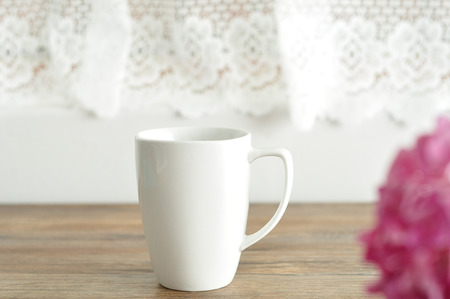 A white mug with shallow dept of fieldの写真素材