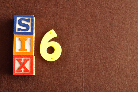 Number 6 displayed as a word and a numberの写真素材