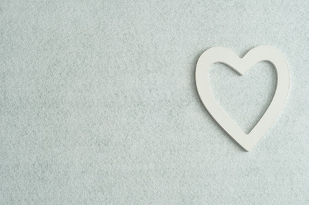 Valentine's Day. A white heart isolated against a white background
