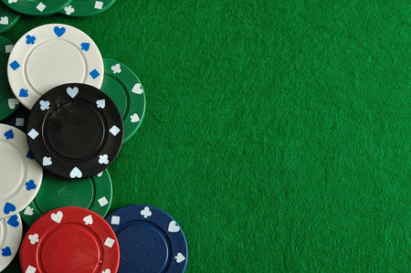 Poker chips forming a border on the right with a green background