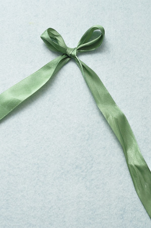 A green bow isolated on a white backgroundの写真素材
