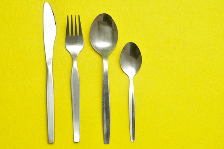 Knife, fork, teaspoon and dessert spoon