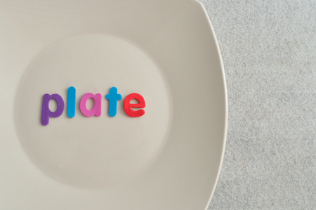 The word plate displayed with a white plateの写真素材