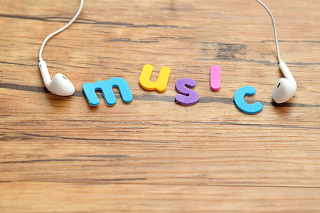White earphones with the word musicの写真素材