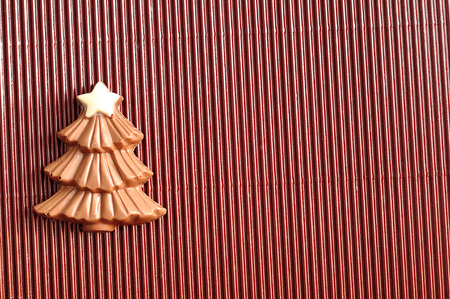 A chocolate christmas tree decorated with a white starの写真素材