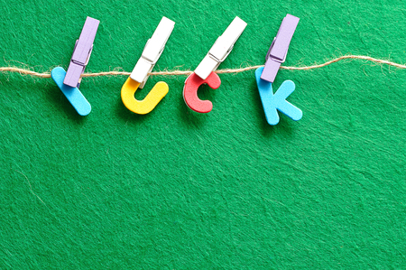 The word luck hanging on a string for Saint Patricks dayの写真素材