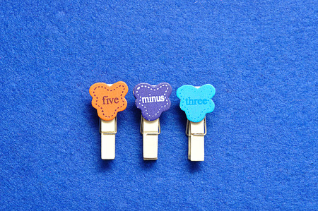 Five minus three on a blue background