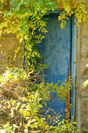 A doorway in an abandoned farmhouseの写真素材