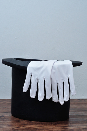A magician hat with a pair of glovesの写真素材