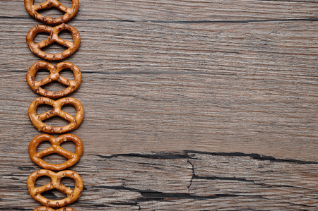 A row of golden brown pretzelsの写真素材