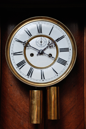 A clock face of an antique clockの写真素材