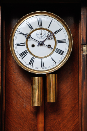 A clock face of an antique clockの写真素材