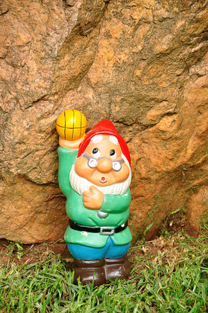 A garden gnome in a gardenの写真素材