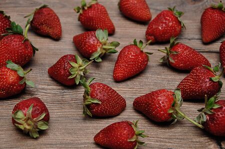 Strawberries on a wooden backgroundの写真素材