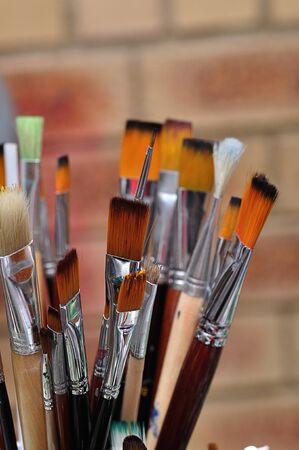 A variety of paint brushes with selective focusの写真素材
