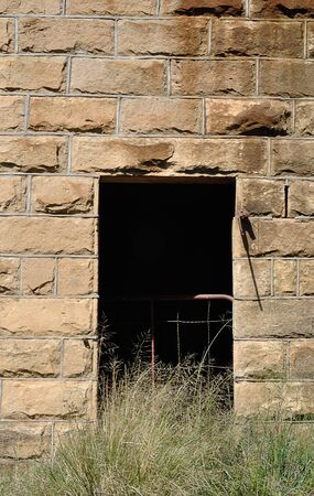 A door of an abandoned buildingの写真素材