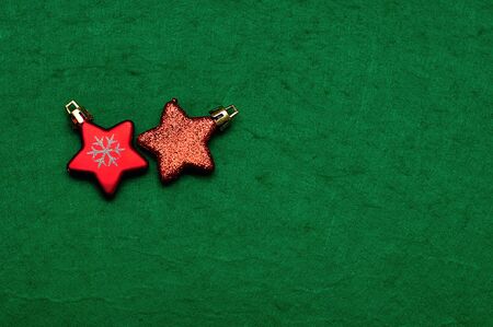 Christmas tree decorations in the shape of a red starsの写真素材