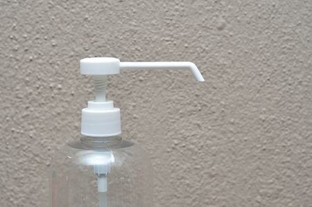 A white nozzle on a plastic bottleの写真素材