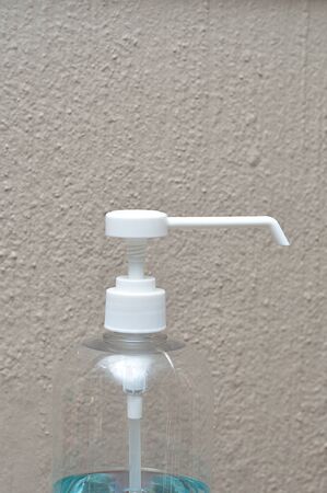 A white nozzle on a plastic bottleの写真素材