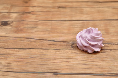 A purple meringue on a tableの写真素材