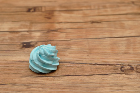 A blue meringue on a tableの写真素材