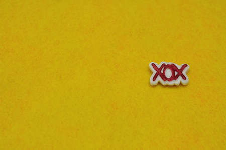 XOX on a yellow background for Valentines dayの写真素材