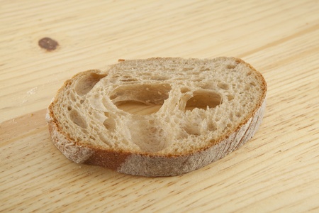 Fresh bread  on the wooden  boardの写真素材