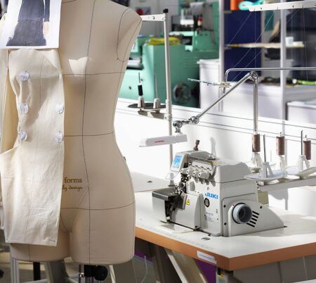 Moscow,RF, 03.20.2019: Atelier tailoring. The provision of seamstress services Mannequin and sewing machine Sewing factoryのeditorial素材
