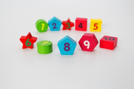 Wooden figures with numbers 1, 2, 3 ... and 10. Wooden cubes with numbers for children. Learn...